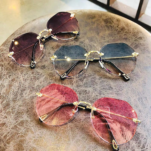 Lunettes de Soleil Polygone Sans Monture – Élégance Futuriste pour Femmes