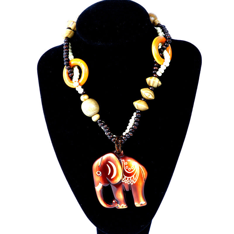 Collier Long en Bois avec Pendentif Éléphant