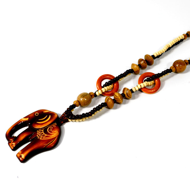 Collier Long en Bois avec Pendentif Éléphant