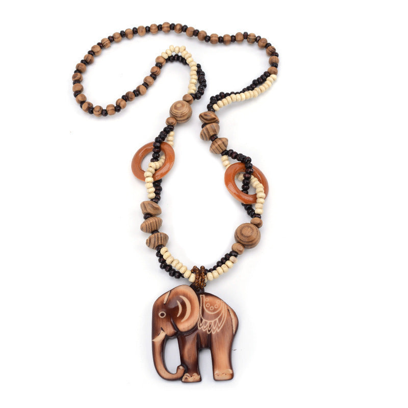 Collier Long en Bois avec Pendentif Éléphant