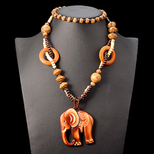 Collier Long en Bois avec Pendentif Éléphant