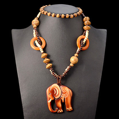 Collier Long en Bois avec Pendentif Éléphant