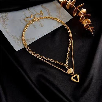 Collier Cœurs & Ailes d’Ange en Acier Titane