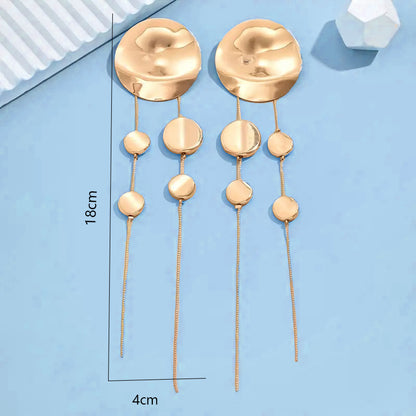 Boucles d’Oreilles Longues à Pampilles – Motif Léopard Chic & Tendance 2025